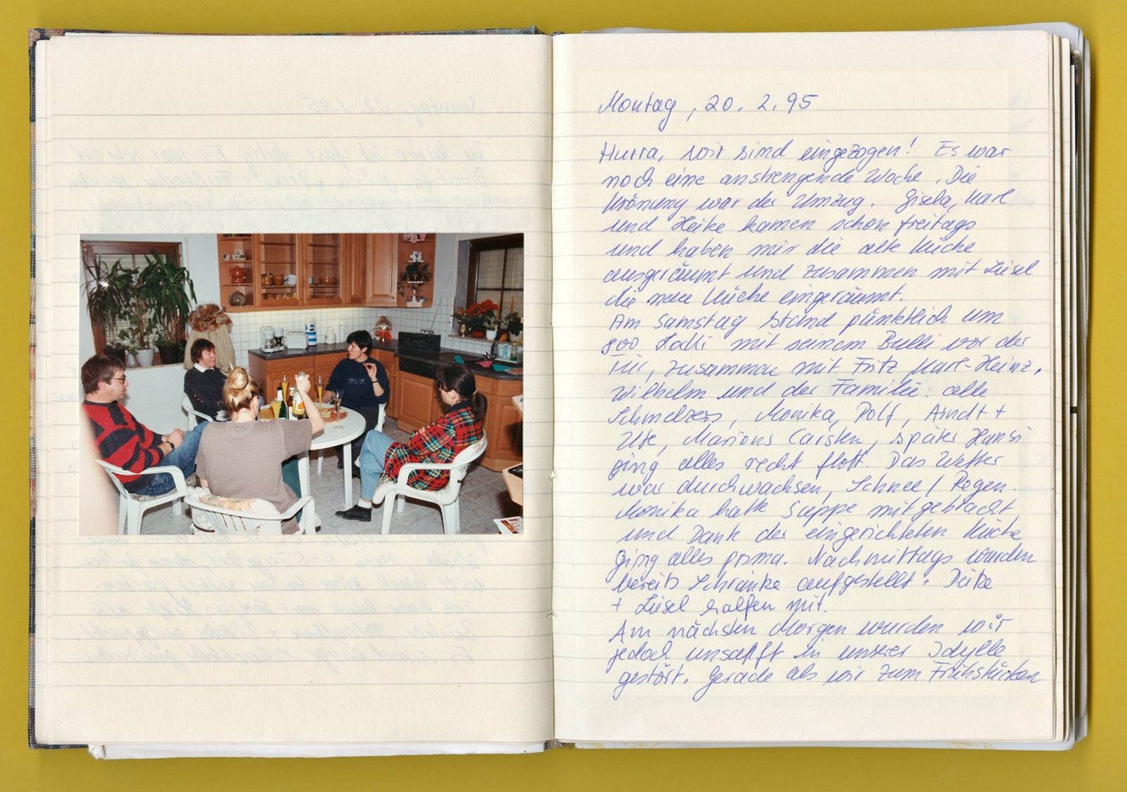 Photo: A page from a notebook with an entry and photos documenting the move into the completed house in 1995.