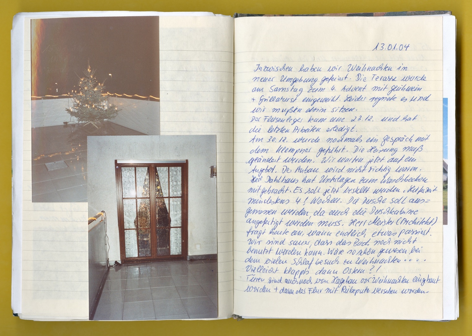 Photo: A page from a notebook with an entry and photos of Christmas in a new setting in 2004.