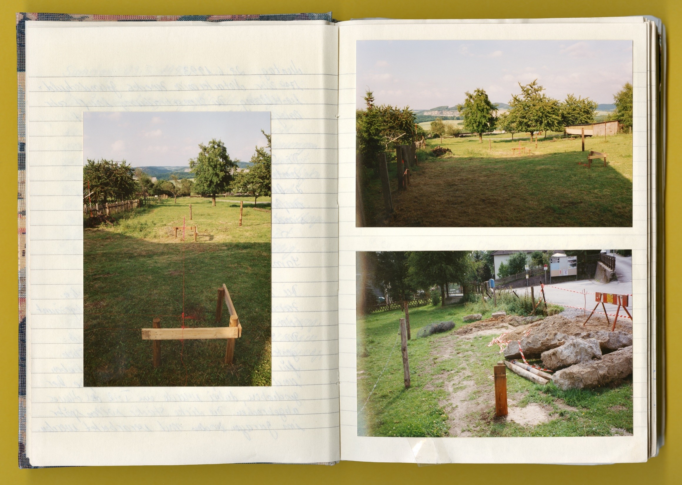 Photo: A page from a notebook with photos of the property.